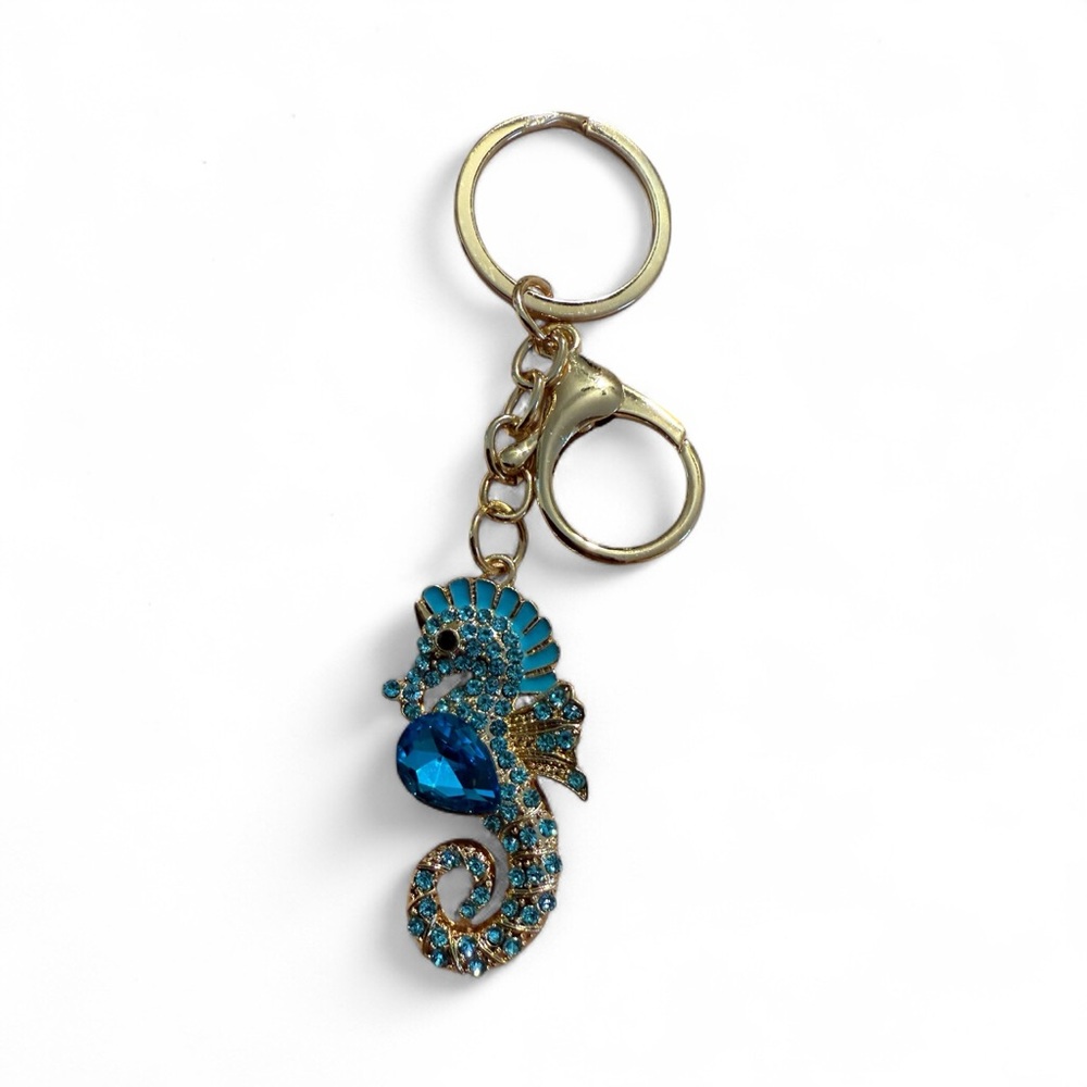 Sparkly Blue Seahorse Keychain with Gold Accents.
